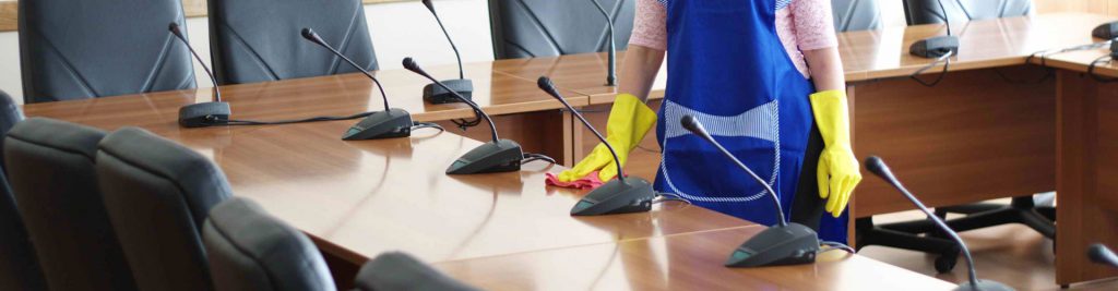 Patriot USA staff cleaning a corporate boardroom